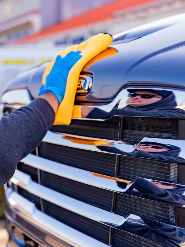 person washing the car Ceramic Coating for RVs & Airstreams